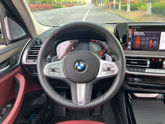 BMW X3 2023 xDrive30i Leading Type M Obsidian Night Suit interior photo 13