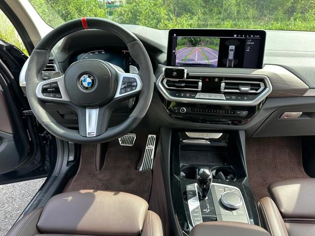 BMW X3 2022 xDrive30i Leading Type M Obsidian Night Suit interior photo 11