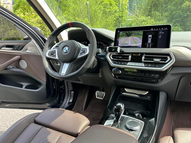 BMW X3 2022 xDrive30i Leading Type M Obsidian Night Suit interior photo 12