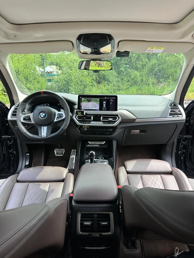 BMW X3 2022 xDrive30i Leading Type M Obsidian Night Suit interior photo 13