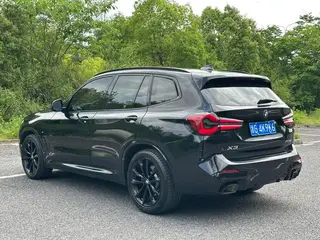 BMW X3 2022 xDrive30i Leading Type M Obsidian Night Suit interior photo 14