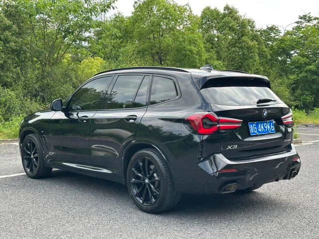 BMW X3 2022 xDrive30i Leading Type M Obsidian Night Suit interior photo 14