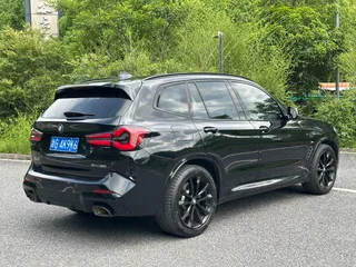 BMW X3 2022 xDrive30i Leading Type M Obsidian Night Suit interior photo 15
