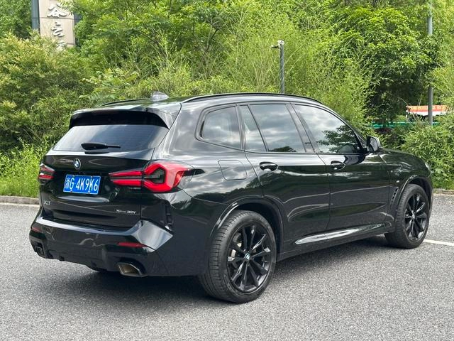 BMW X3 2022 xDrive30i Leading Type M Obsidian Night Suit interior photo 15