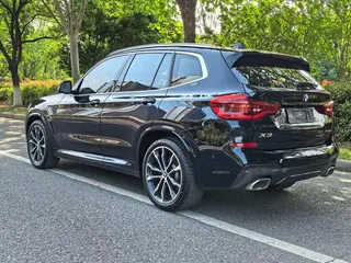 BMW X3 2021 xDrive30i Líder M Conjunto deportivo exterior foto 4
