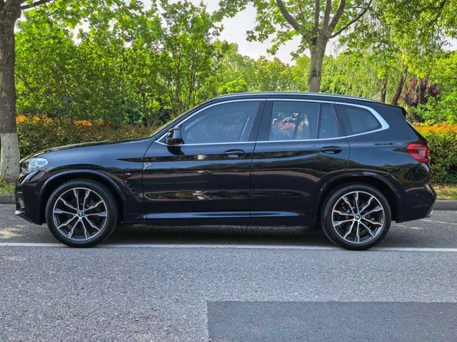 BMW X3 2021 xDrive30i Líder M Conjunto deportivo exterior foto 5