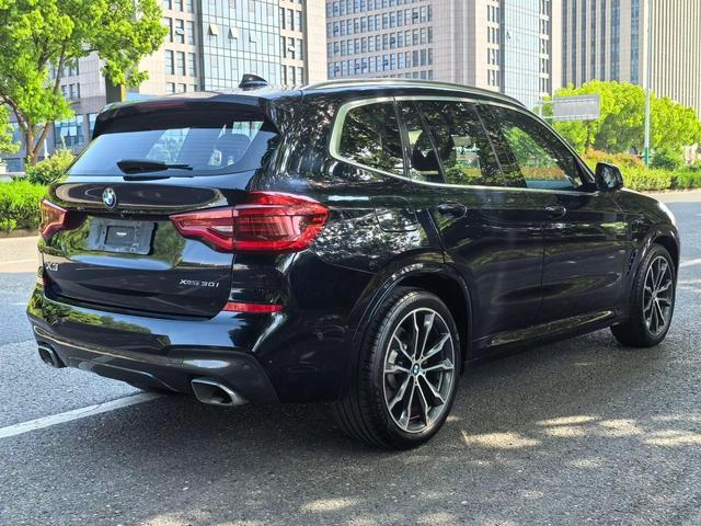 BMW X3 2021 xDrive30i Líder M Conjunto deportivo interior foto 8