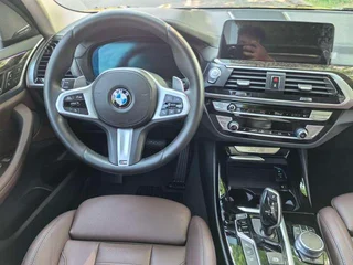 BMW X3 2021 xDrive30i Líder M Conjunto deportivo interior foto 11