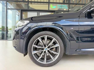 BMW X3 2023 xDrive30i Leading Type M Obsidian Night Suit interior photo 8