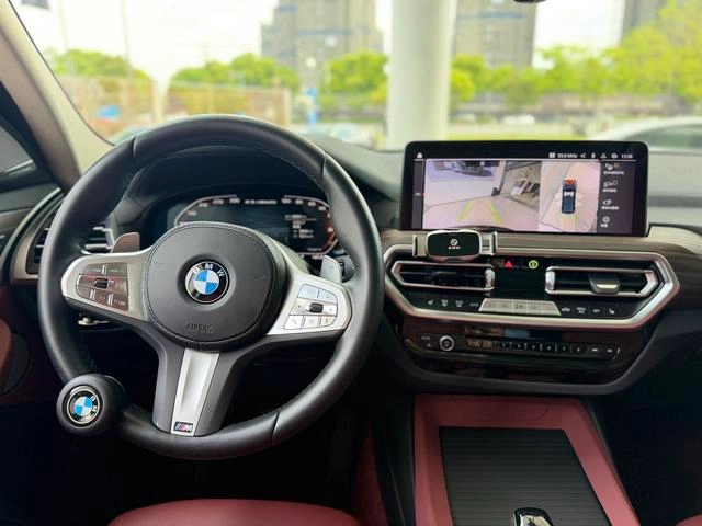 BMW X3 2023 xDrive30i Leading Type M Obsidian Night Suit interior photo 11