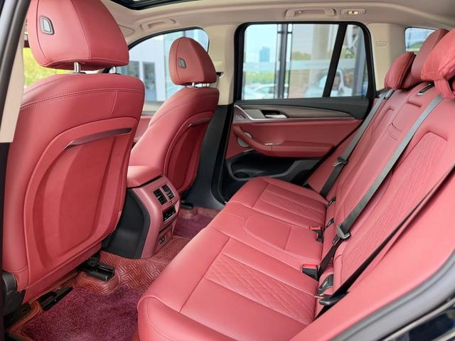 BMW X3 2023 xDrive30i Leading Type M Obsidian Night Suit interior photo 13