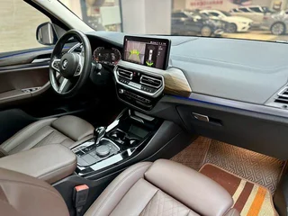 BMW X3 2022 xDrive30i Leading Type M Obsidian Night Suit interior photo 9