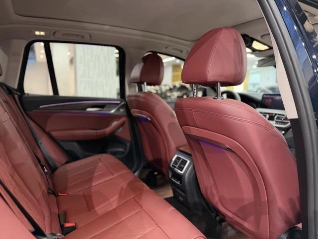 BMW X3 2023 xDrive30i Leading Type M Obsidian Night Suit interior photo 14