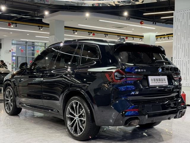 BMW X3 2023 xDrive30i Leading Type M Obsidian Night Suit interior photo 15