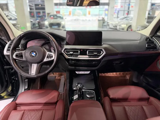 BMW X3 2022 xDrive30i Leading Type M Obsidian Night Suit interior photo 10