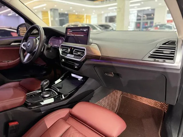 BMW X3 2022 xDrive30i Leading Type M Obsidian Night Suit interior photo 11