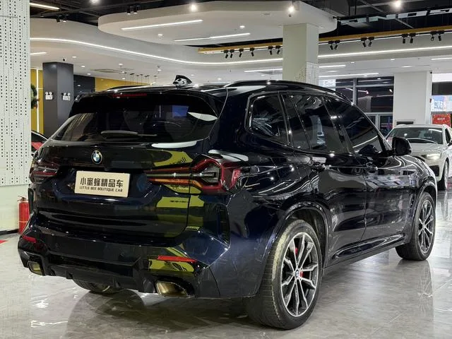 BMW X3 2022 xDrive30i Leading Type M Obsidian Night Suit interior photo 13