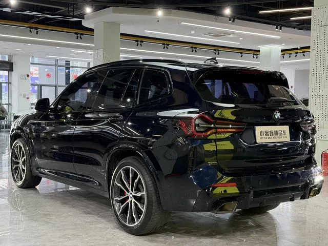 BMW X3 2022 xDrive30i Leading Type M Obsidian Night Suit interior photo 17
