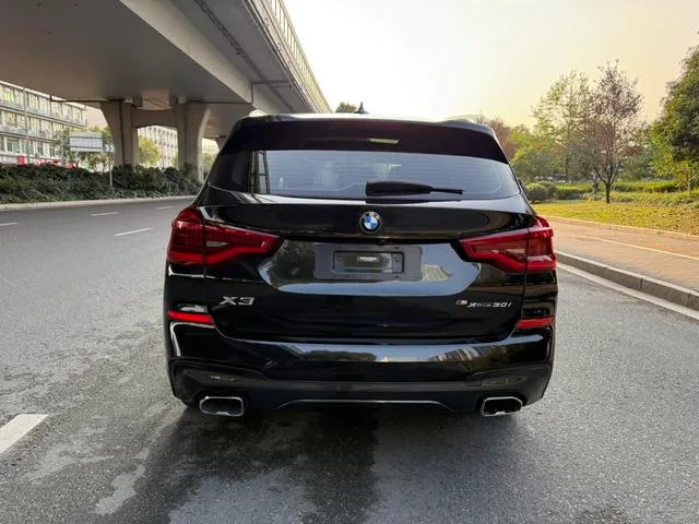 BMW X3 2021 xDrive30i Líder M Conjunto deportivo exterior foto 5