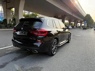 BMW X3 2021 xDrive30i Líder M Conjunto deportivo exterior foto 6