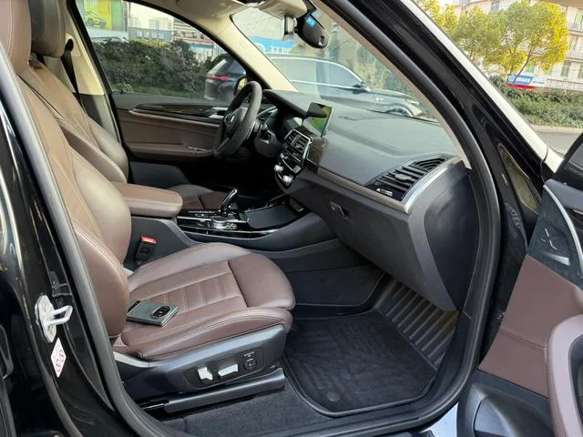 BMW X3 2021 xDrive30i Líder M Conjunto deportivo interior foto 9