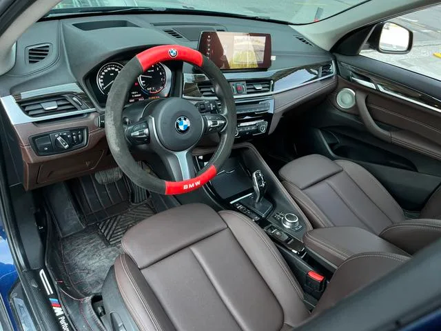 BMW X1 2021 xDrive25Li Tipo de lujo interior foto 11