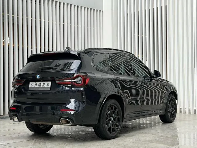 BMW X3 2022 xDrive25i M Спортивный костюм интерьер фото 12