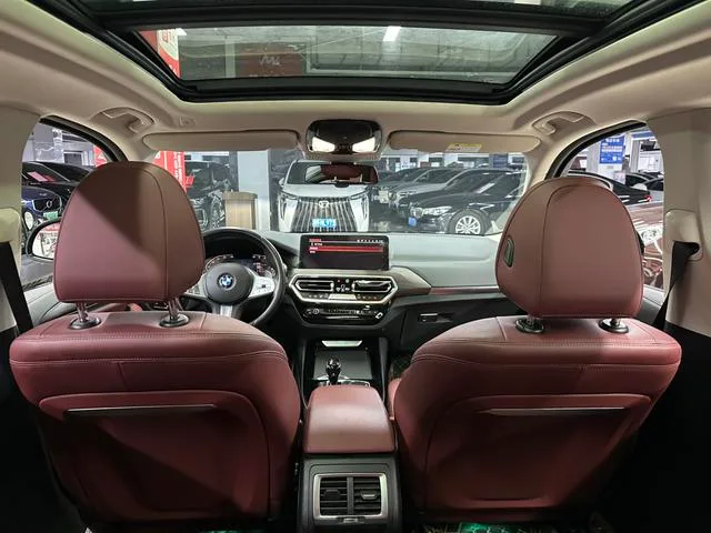 BMW X3 2023 xDrive30i Premium Class M Obsidian Night Suit interior photo 11