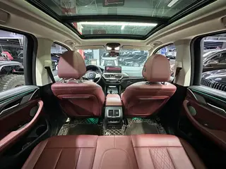 BMW X3 2023 xDrive30i Premium Class M Obsidian Night Suit interior photo 12