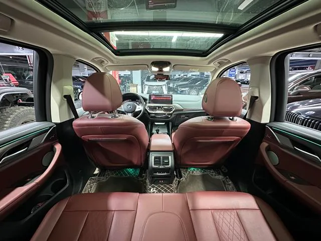 BMW X3 2023 xDrive30i Premium Class M Obsidian Night Suit interior photo 12