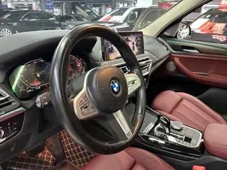 BMW X3 2023 xDrive30i Premium Class M Obsidian Night Suit interior photo 13