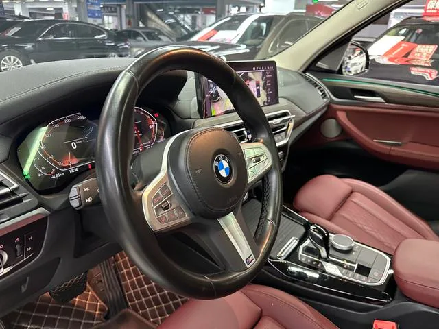 BMW X3 2023 xDrive30i Premium Class M Obsidian Night Suit interior photo 13