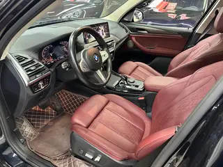 BMW X3 2023 xDrive30i Premium Class M Obsidian Night Suit interior photo 14