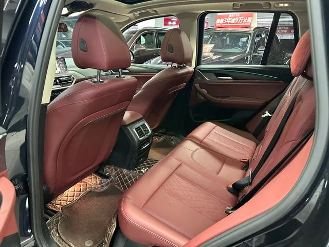 BMW X3 2023 xDrive30i Premium Class M Obsidian Night Suit interior photo 19