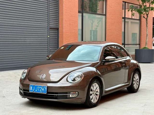 Volkswagen Beetle 2014 1.4TSI Fashionable exterior photo 1 Volkswagen Beetle 2014 1.4TSI Fashionable exterior photo 1
