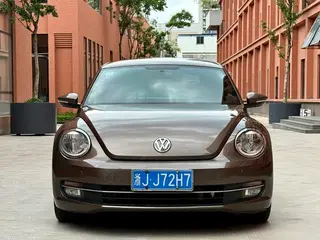 Volkswagen Beetle 2014 1.4TSI Fashionable exterior photo 2 Volkswagen Beetle 2014 1.4TSI Fashionable exterior photo 2