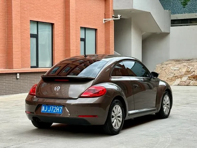 Volkswagen Beetle 2014 1.4TSI Fashionable exterior photo 4 Volkswagen Beetle 2014 1.4TSI Fashionable exterior photo 4