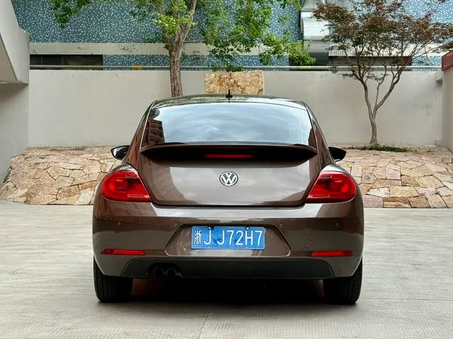 Volkswagen Beetle 2014 1.4TSI Fashionable exterior photo 5 Volkswagen Beetle 2014 1.4TSI Fashionable exterior photo 5