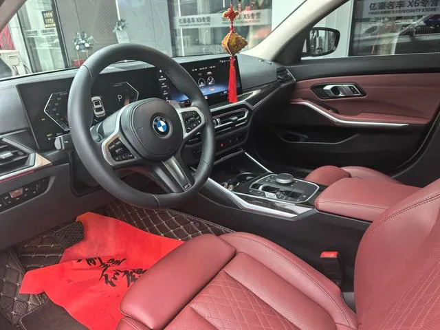 BMW 3 Series 2023 325Li M Спортивный костюм интерьер фото 7 BMW 3 Series 2023 325Li M Спортивный костюм интерьер фото 7