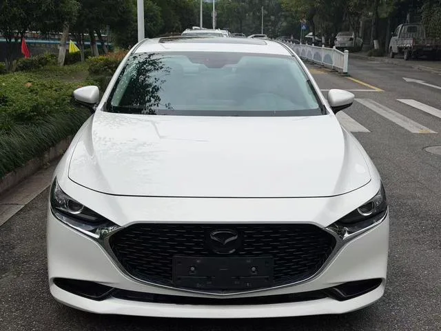 Mazda Mazda3 Axela 2021 2.0L Automatic quality dazzle version exterior photo 2 Mazda Mazda3 Axela 2021 2.0L Automatic quality dazzle version exterior photo 2
