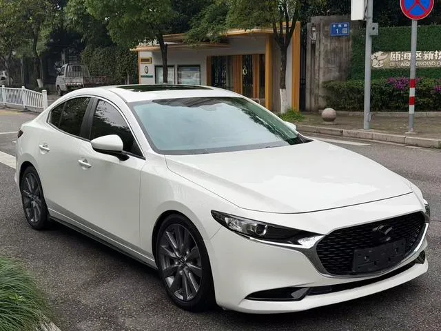 Mazda Mazda3 Axela 2021 2.0L Automatic quality dazzle version exterior photo 3 Mazda Mazda3 Axela 2021 2.0L Automatic quality dazzle version exterior photo 3