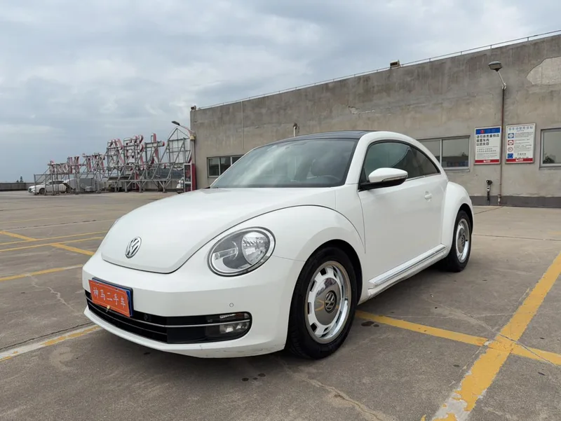 Volkswagen Beetle 2013 1.4TSI Luxury type exterior photo 1 Volkswagen Beetle 2013 1.4TSI Luxury type exterior photo 1