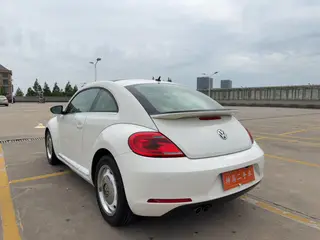 Volkswagen Beetle 2013 1.4TSI Luxury type exterior photo 4 Volkswagen Beetle 2013 1.4TSI Luxury type exterior photo 4