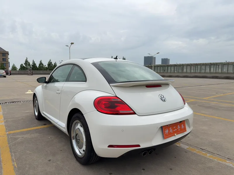 Volkswagen Beetle 2013 1.4TSI Luxury type exterior photo 4 Volkswagen Beetle 2013 1.4TSI Luxury type exterior photo 4