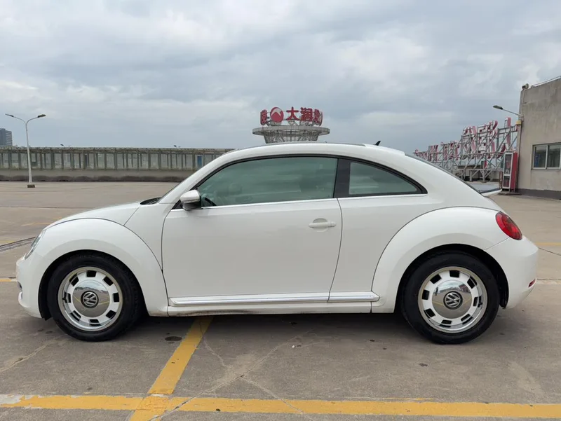 Volkswagen Beetle 2013 1.4TSI Luxury type exterior photo 7 Volkswagen Beetle 2013 1.4TSI Luxury type exterior photo 7