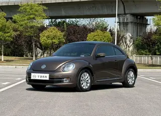Volkswagen Beetle 2013 1.2TSI Comfortable exterior photo 1 Volkswagen Beetle 2013 1.2TSI Comfortable exterior photo 1