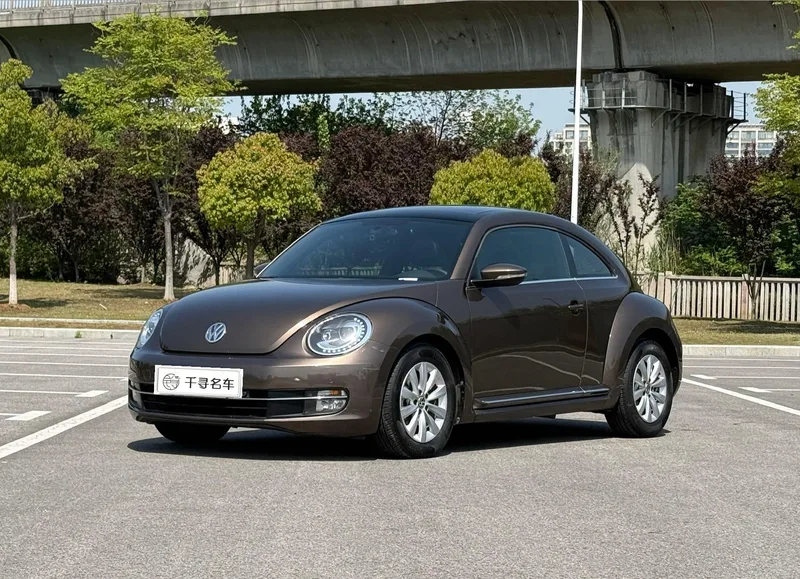 Volkswagen Beetle 2013 1.2TSI Comfortable exterior photo 1 Volkswagen Beetle 2013 1.2TSI Comfortable exterior photo 1