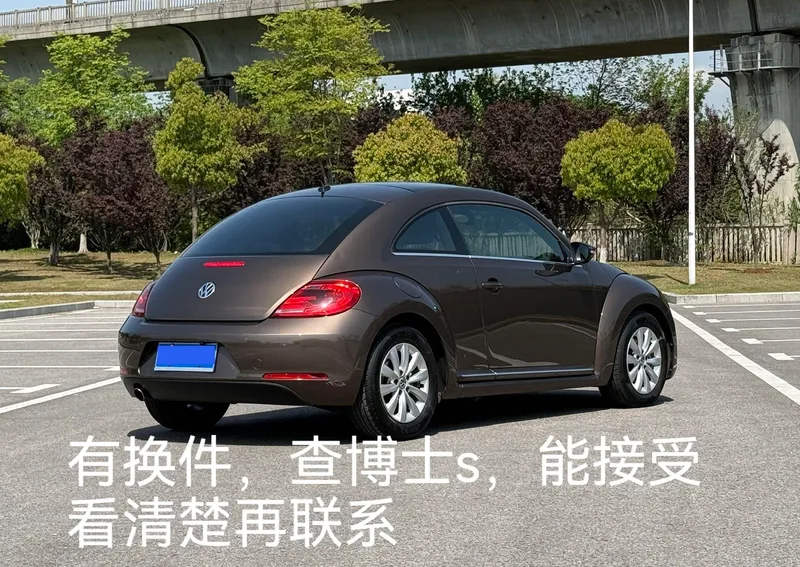 Volkswagen Beetle 2013 1.2TSI Comfortable exterior photo 2 Volkswagen Beetle 2013 1.2TSI Comfortable exterior photo 2