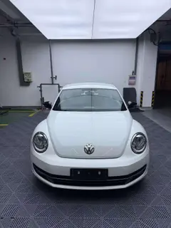 Volkswagen Beetle 2014 1.2TSI Fashionable exterior photo 2 Volkswagen Beetle 2014 1.2TSI Fashionable exterior photo 2
