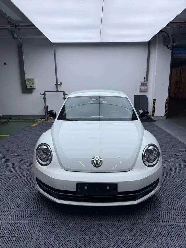 Volkswagen Beetle 2014 1.2TSI Fashionable exterior photo 2 Volkswagen Beetle 2014 1.2TSI Fashionable exterior photo 2